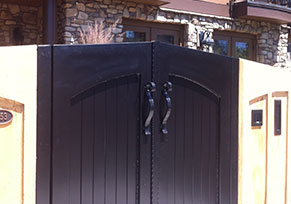 gate with custom iron handles